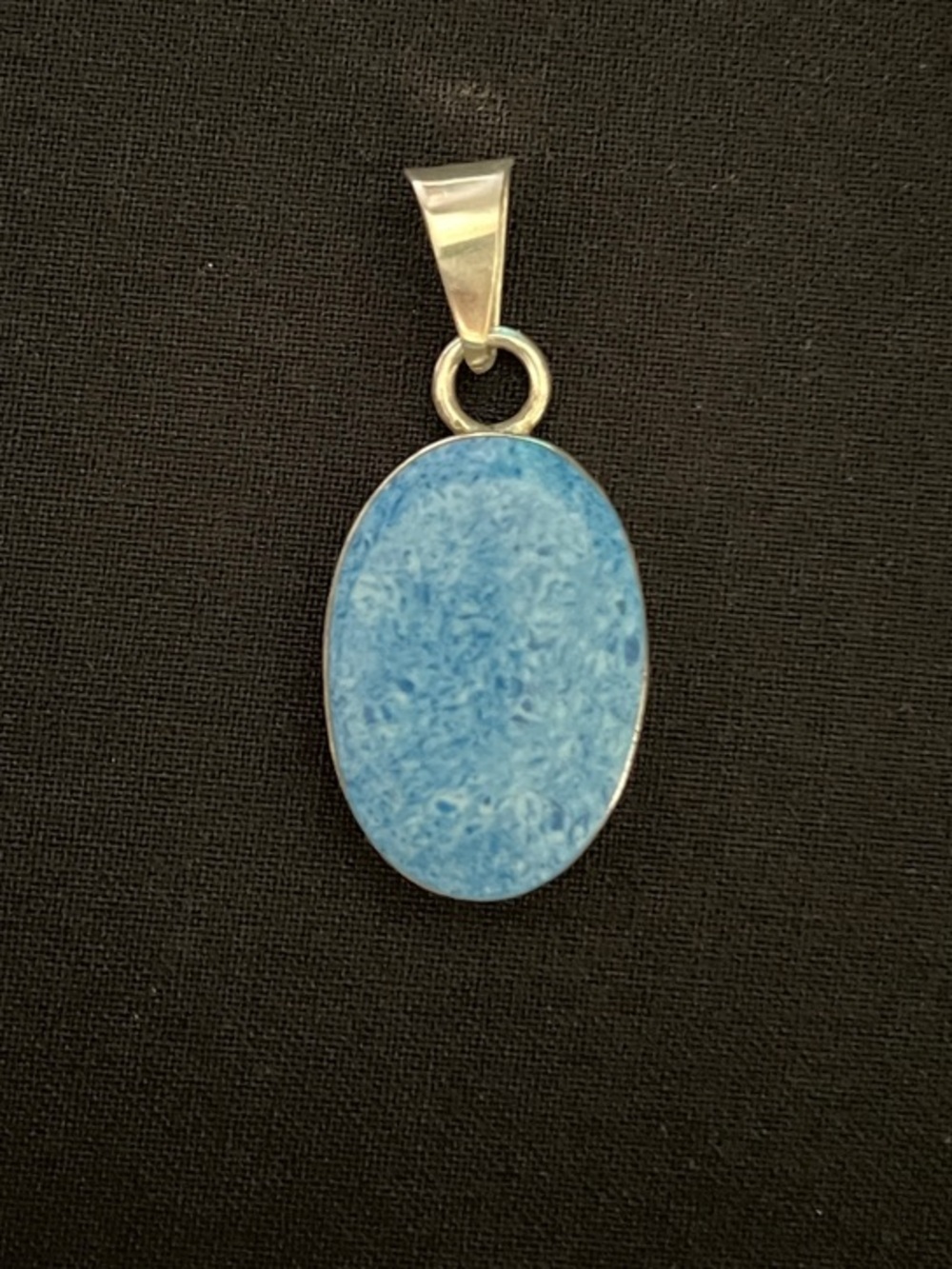 Mexican Polished Light Blue Oval Stone Pendant in Sterling Silver Bezel